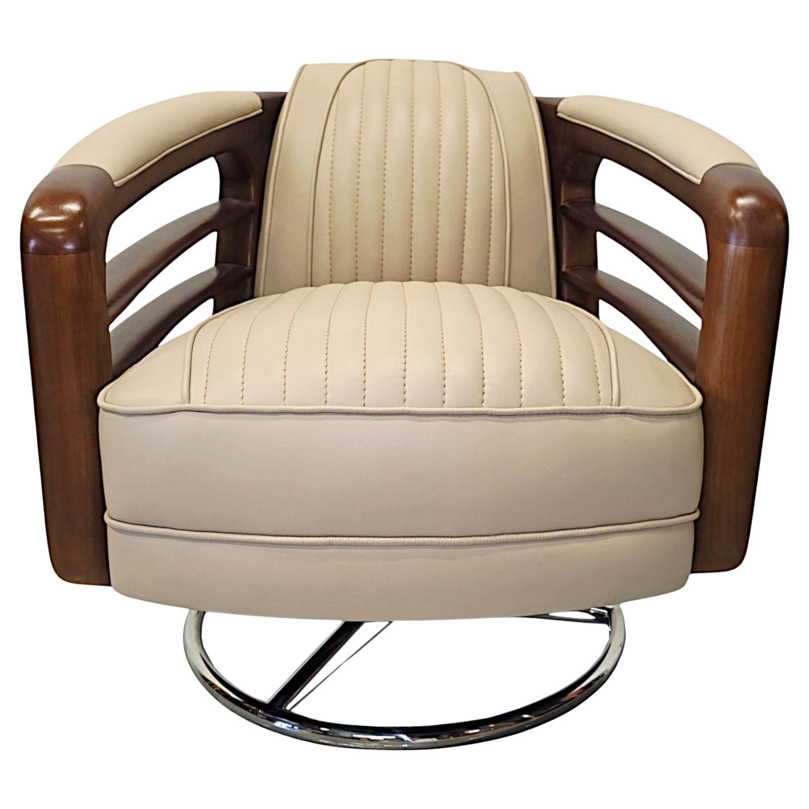 A Stunning Handmade Leather Walnut and Chrome Revolving Armchair For Sale