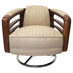 A Stunning Handmade Leather Walnut and Chrome Revolving Armchair