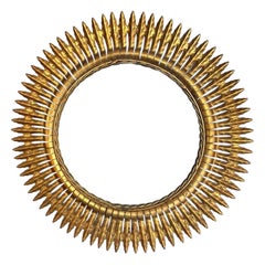 A stunning large 1950s gilt metal Spanish circular sunburst mirror