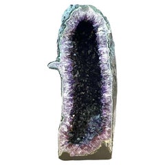 Antique A stunning large high quality  Amethyst geode cave deep purple colour