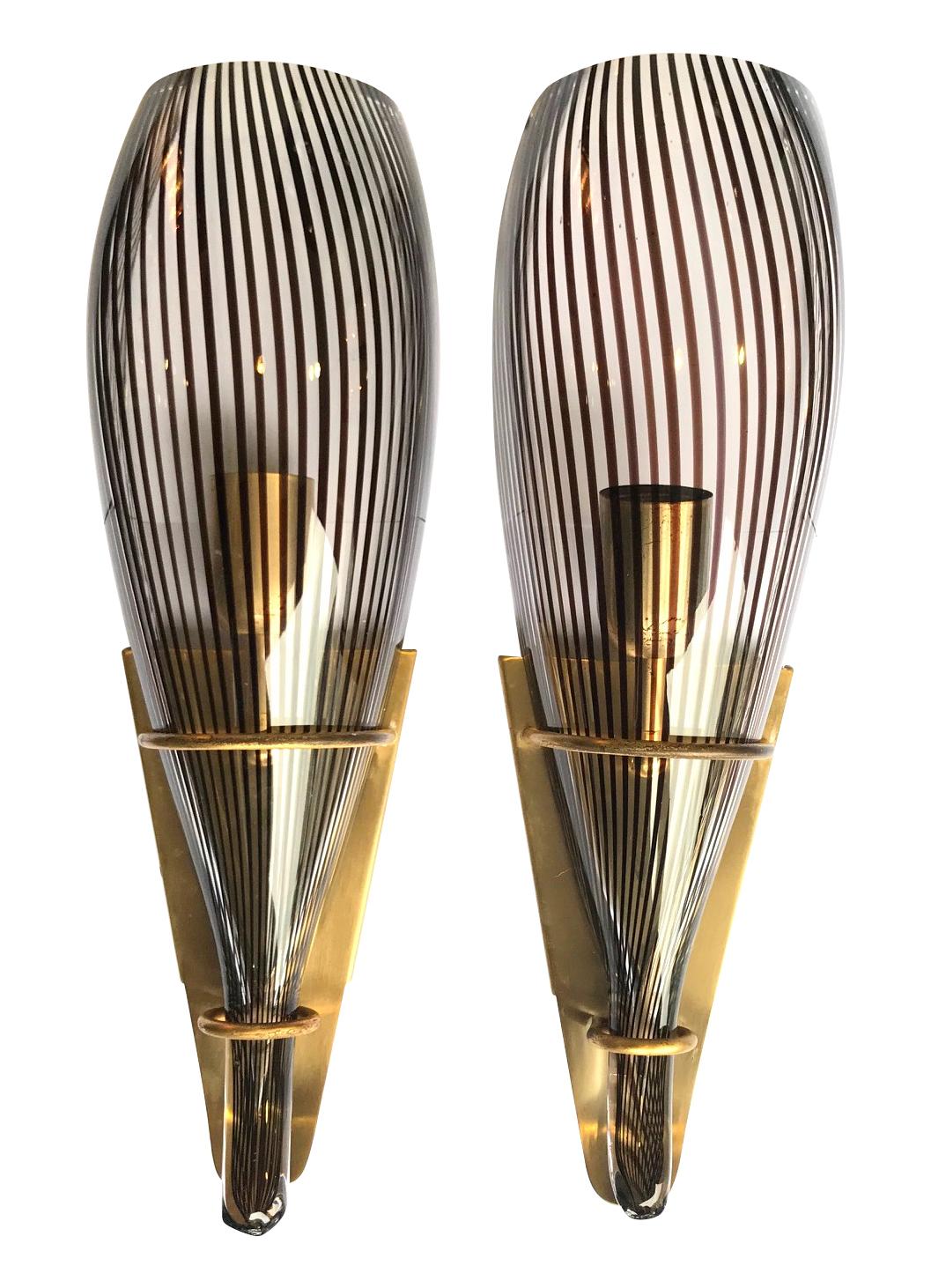 A stunning large pair of striped Murano glass and brass wall sconces by famous Venetian glass artist Lino Tagliapietra, for lighting company La Murrina, Murano, Venice Italy. The stunning curved, conical striped Murano glass shades have a browny