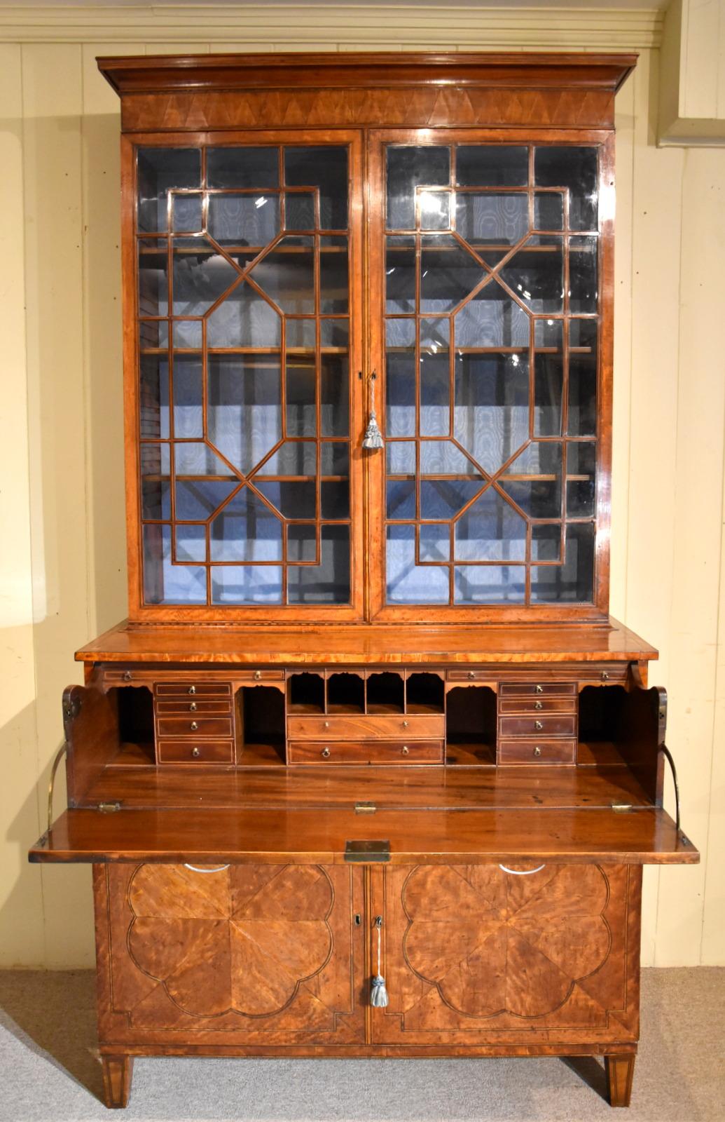 A stunning late 18th century West-Indies satinwood secretaire bookcase, circa 1790.

Dimensions
width 48.75