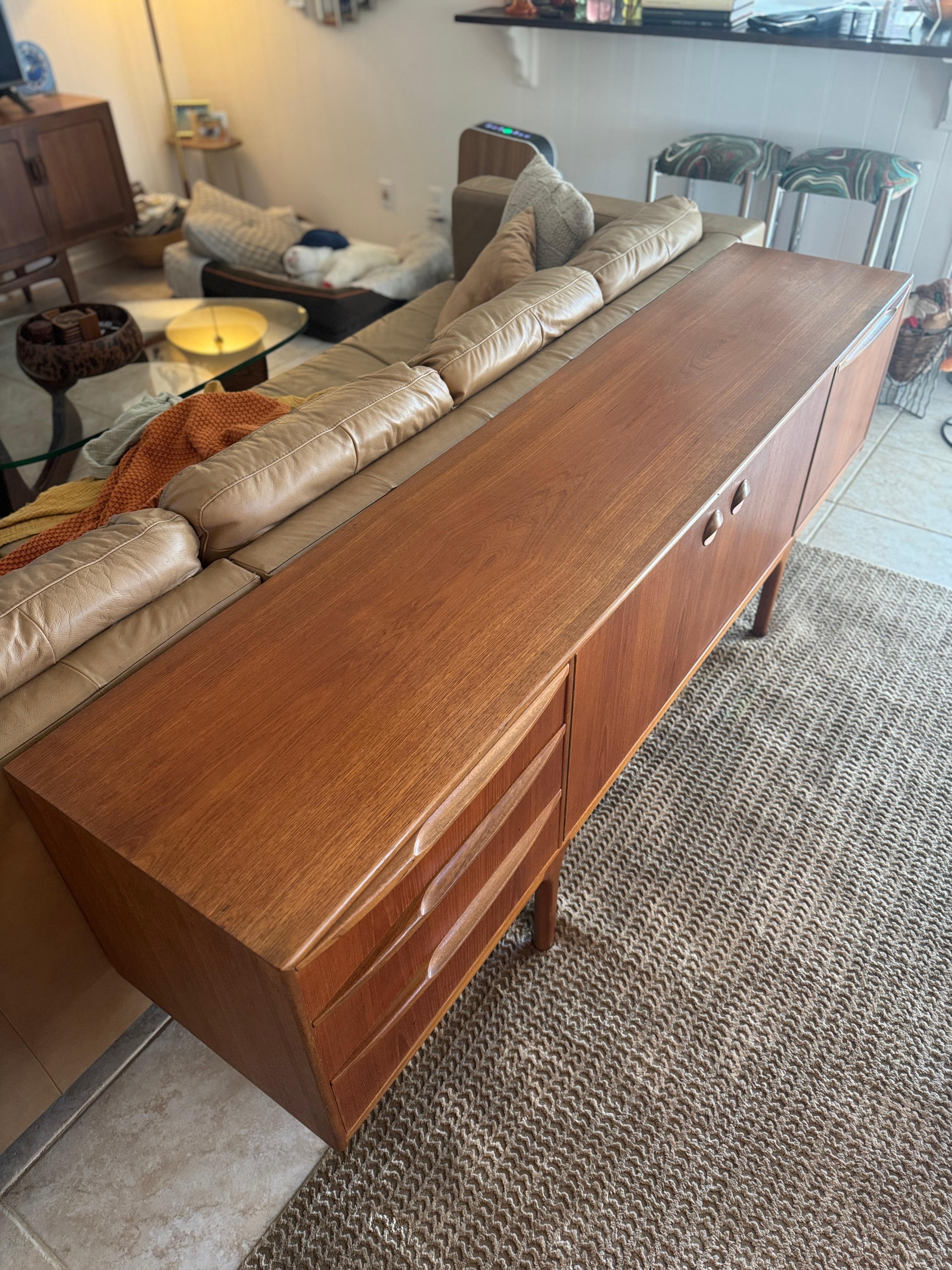 A stunning mid century modern sideboard by Scottish furniture maker McIntosh For Sale 4