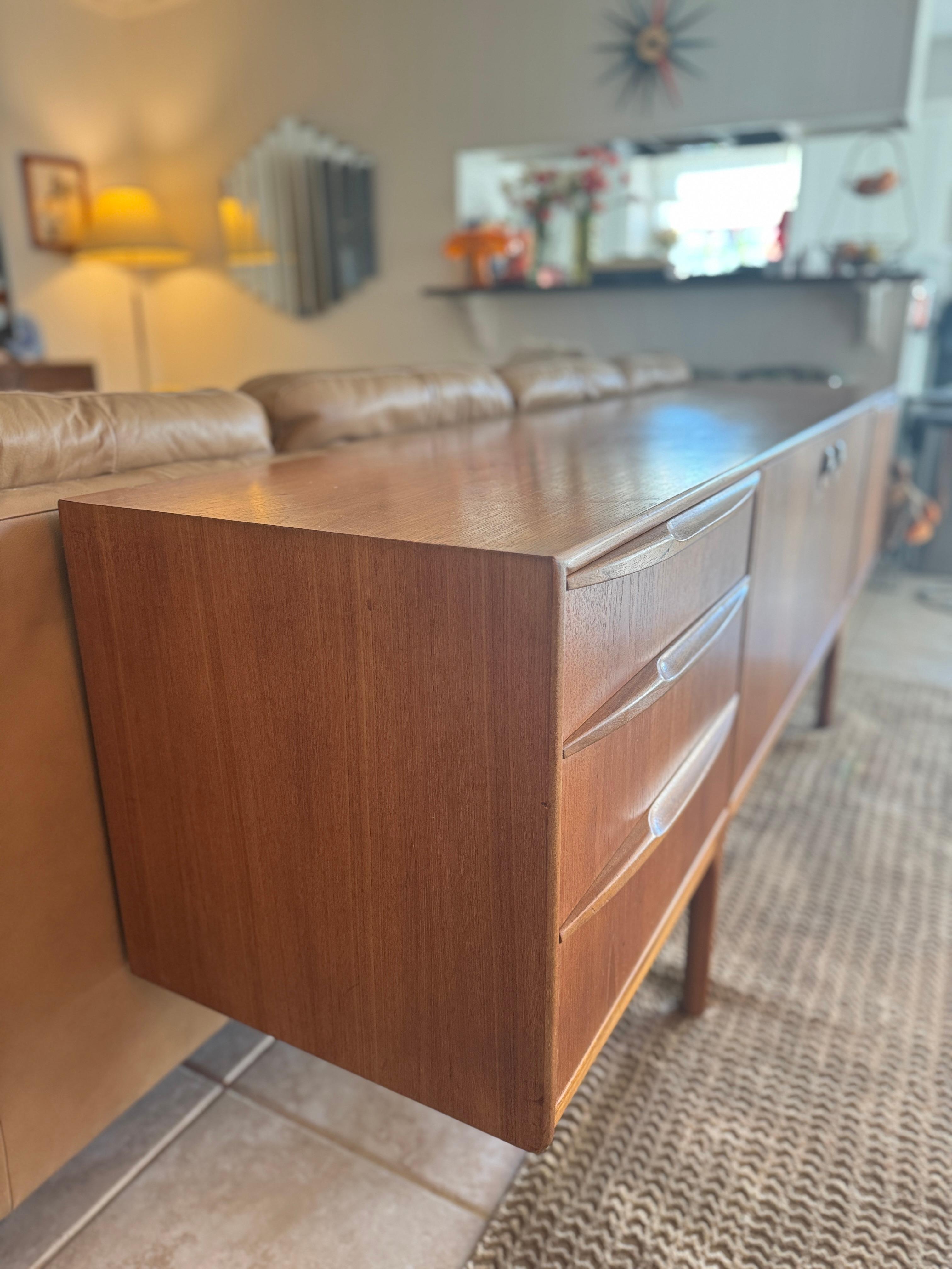 A stunning mid century modern sideboard by Scottish furniture maker McIntosh For Sale 1