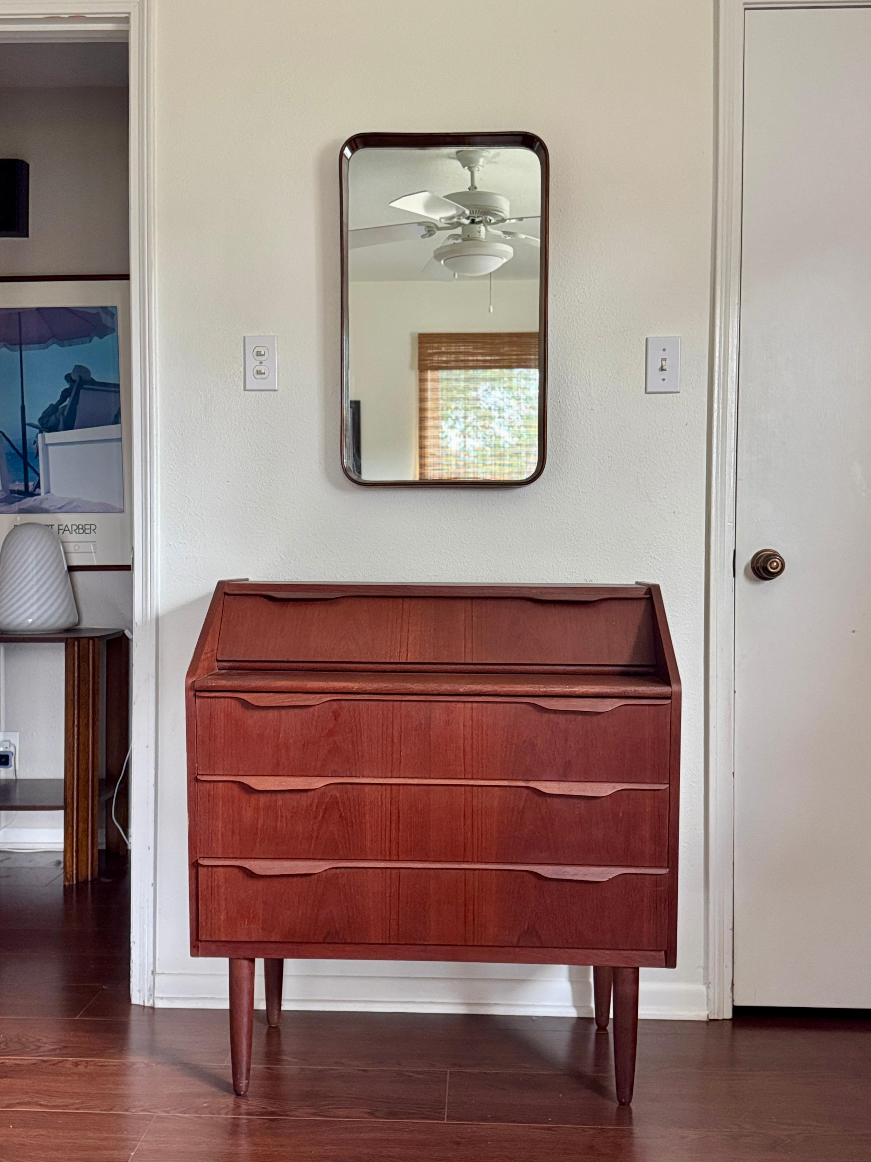 Wood A stunning mid century modern teak secretary desk made in Denmark, circa 1960s For Sale