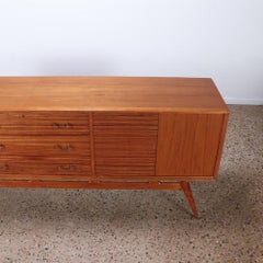 A stunning Mid Century Modern zebra wood sideboard, C. 1950.