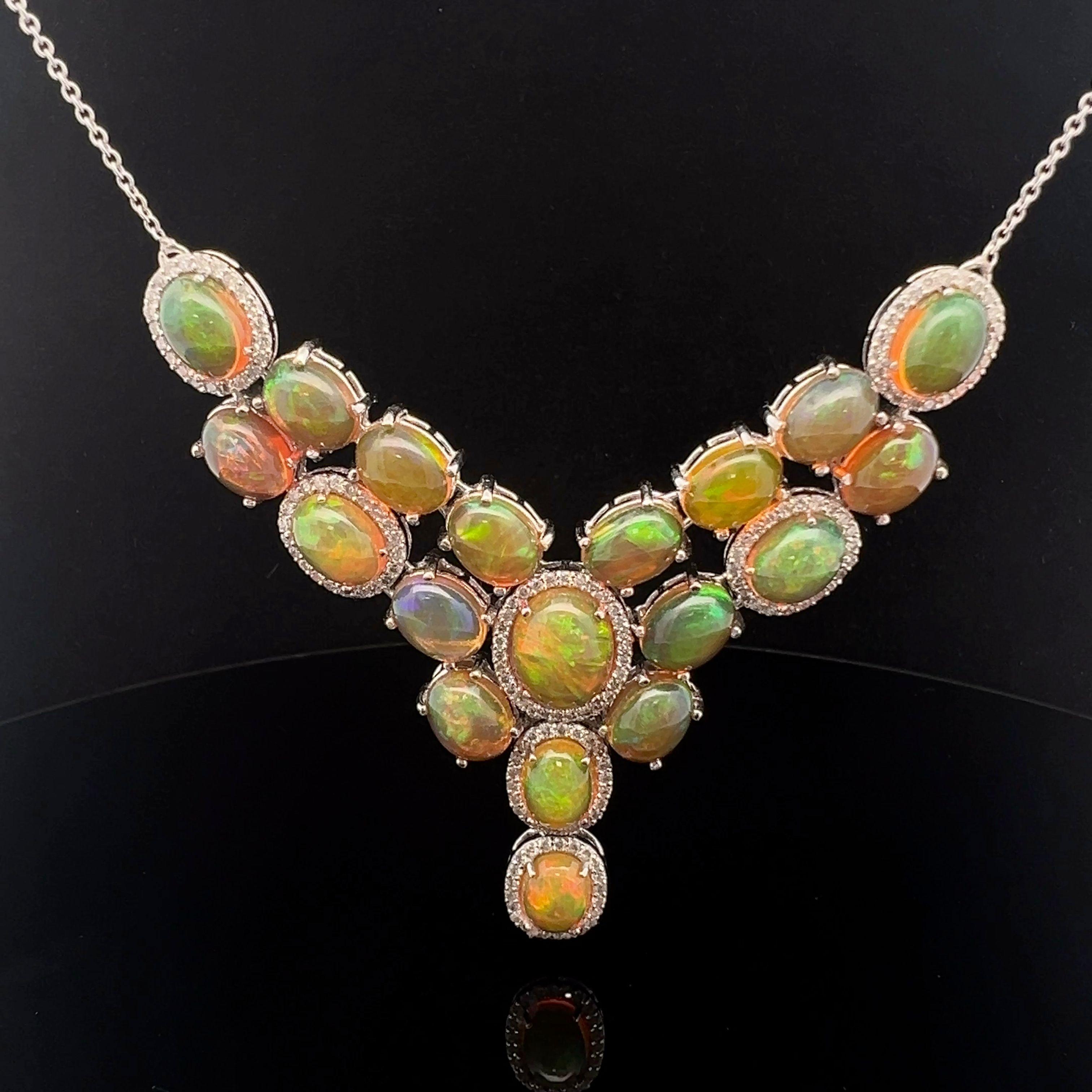 An magnificent necklace made from 16.30-carat natural opal and 1.37-carat diamond, set in 18-karat white gold. 
Beautiful 18-karat white gold opal and diamond necklace, a sophisticated and elegant piece of beauty. This gorgeous necklace has lovely