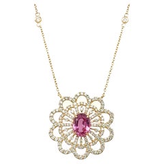 A stunning necklace of natural pink sapphire with diamond