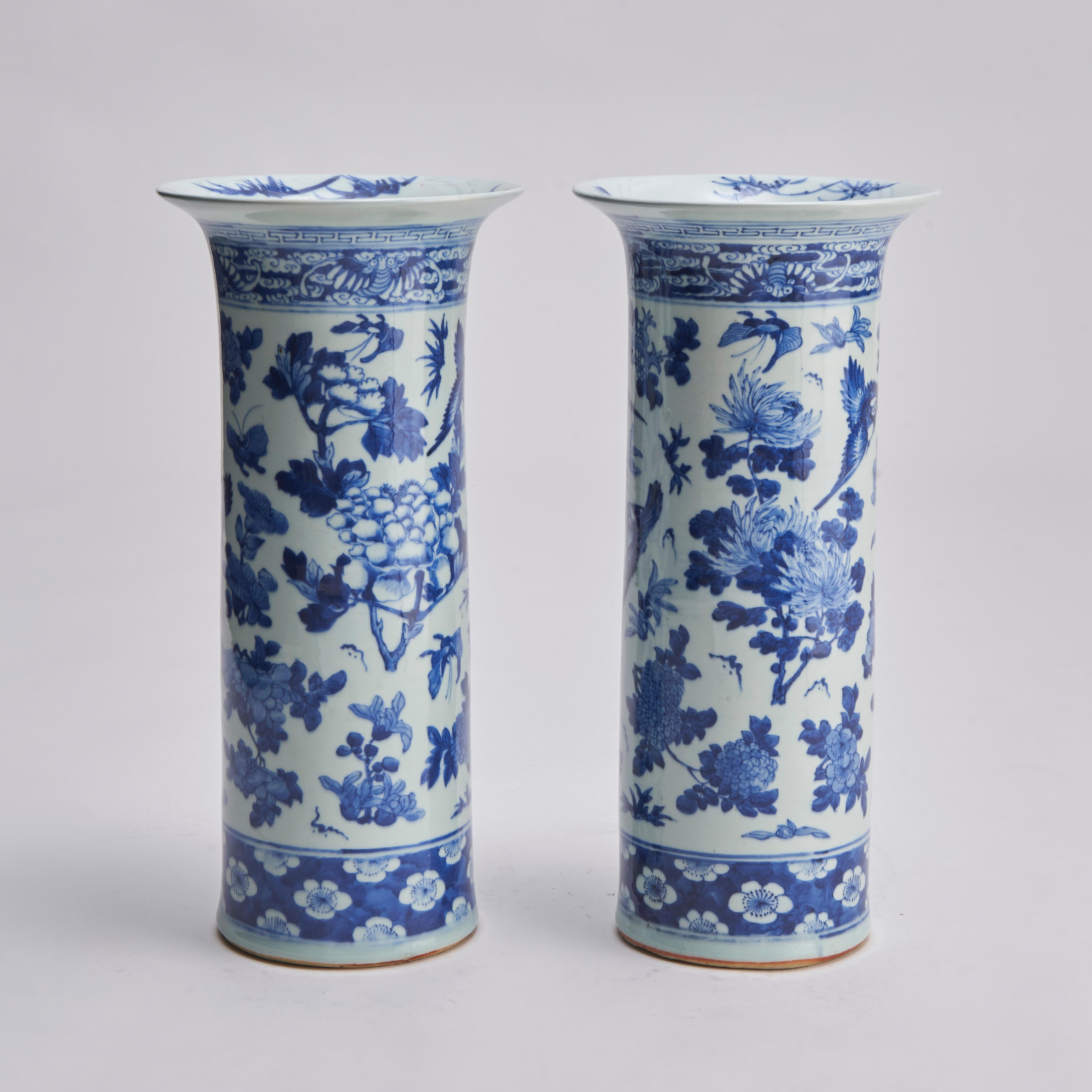 Chinese A stunning pair of 19th Century flare-topped blue and white porcelain vases (Cir For Sale
