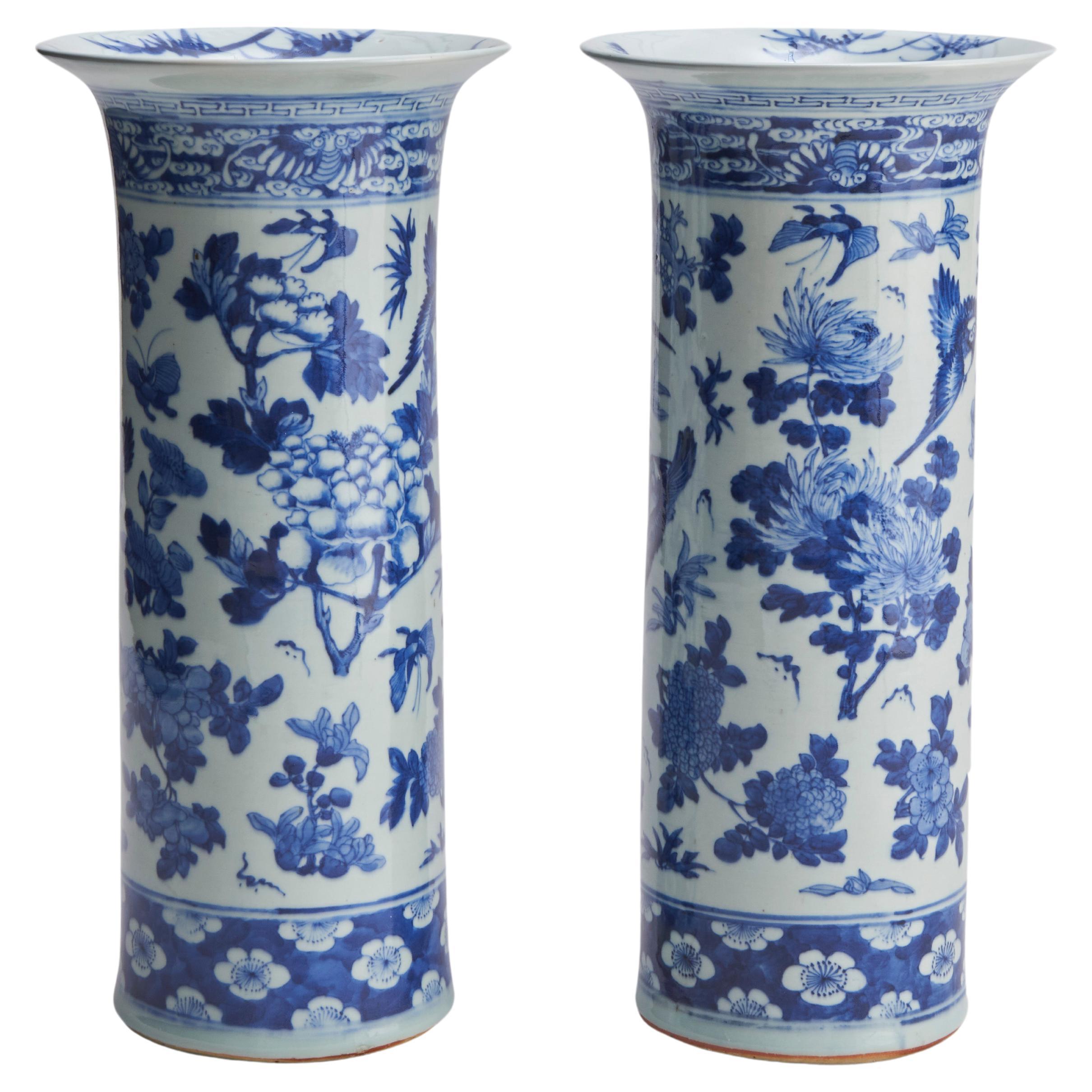 A stunning pair of 19th Century flare-topped blue and white porcelain vases (Cir For Sale