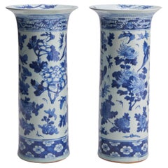 A stunning pair of 19th Century flare-topped blue and white porcelain vases (Cir