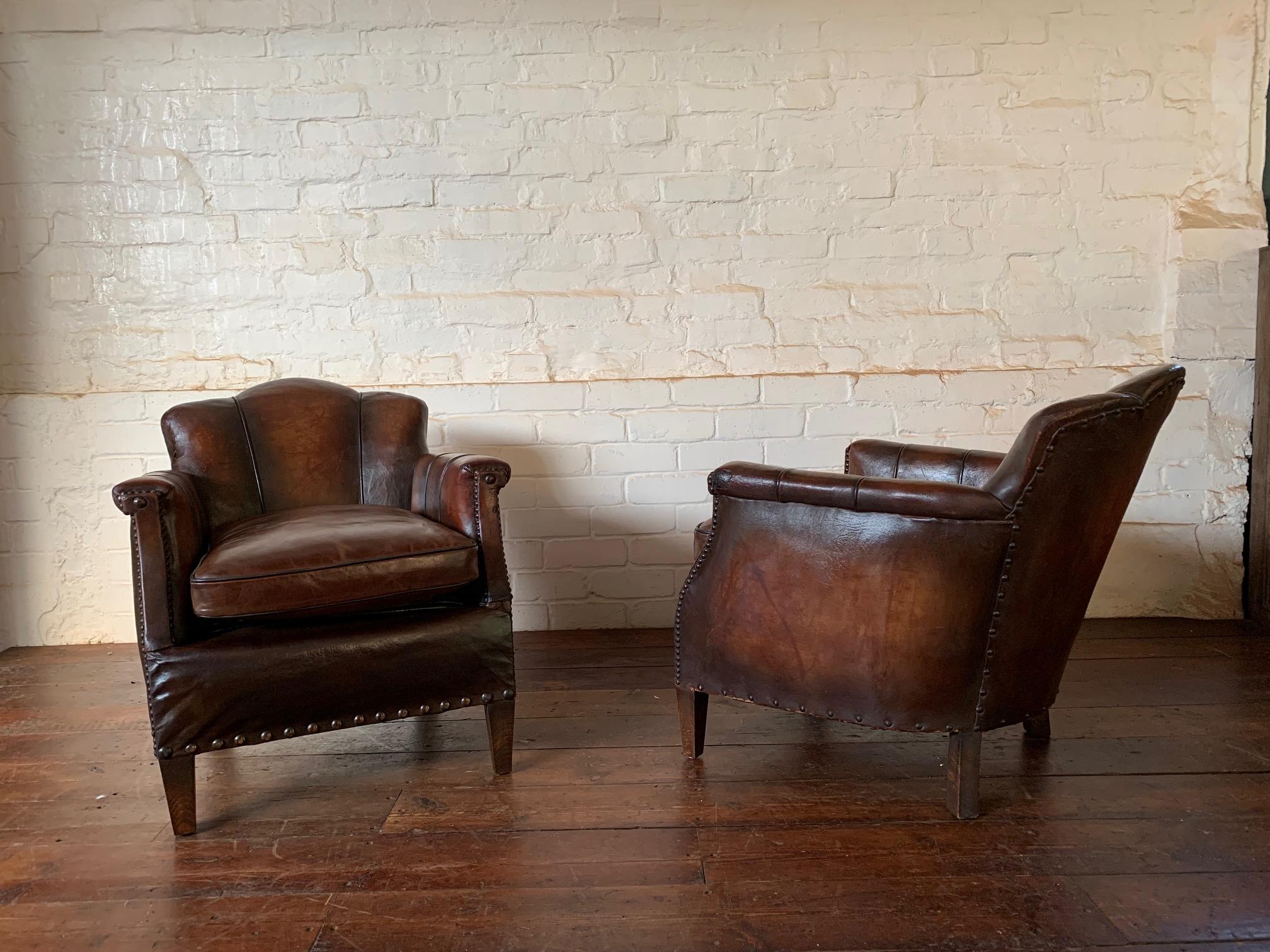 A Stunning Pair of French Leather Club Chairs, Art Deco, Trilobe Models Circa 1930’s

This very pretty pair of chairs is not only amazingly rare but has been beautifully preserved. The leather is exquisite and has aged and patinated perfectly, the