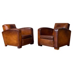 A Stunning Pair of French Leather Club Chairs, Attributed to Jacques Adnet C1950