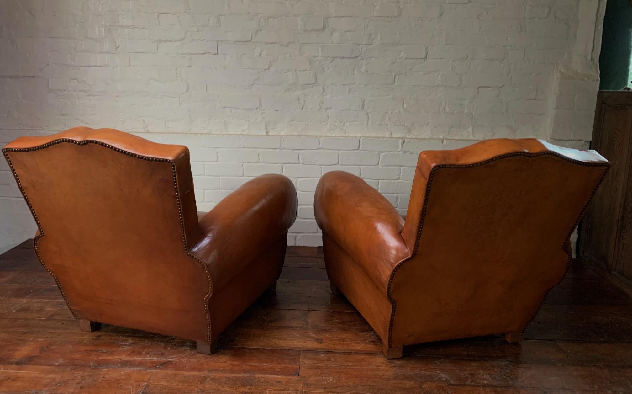 A Stunning Pair of French Leather Club Chairs, Caramel Moustache Models, C1940's In Excellent Condition In Hastings, GB