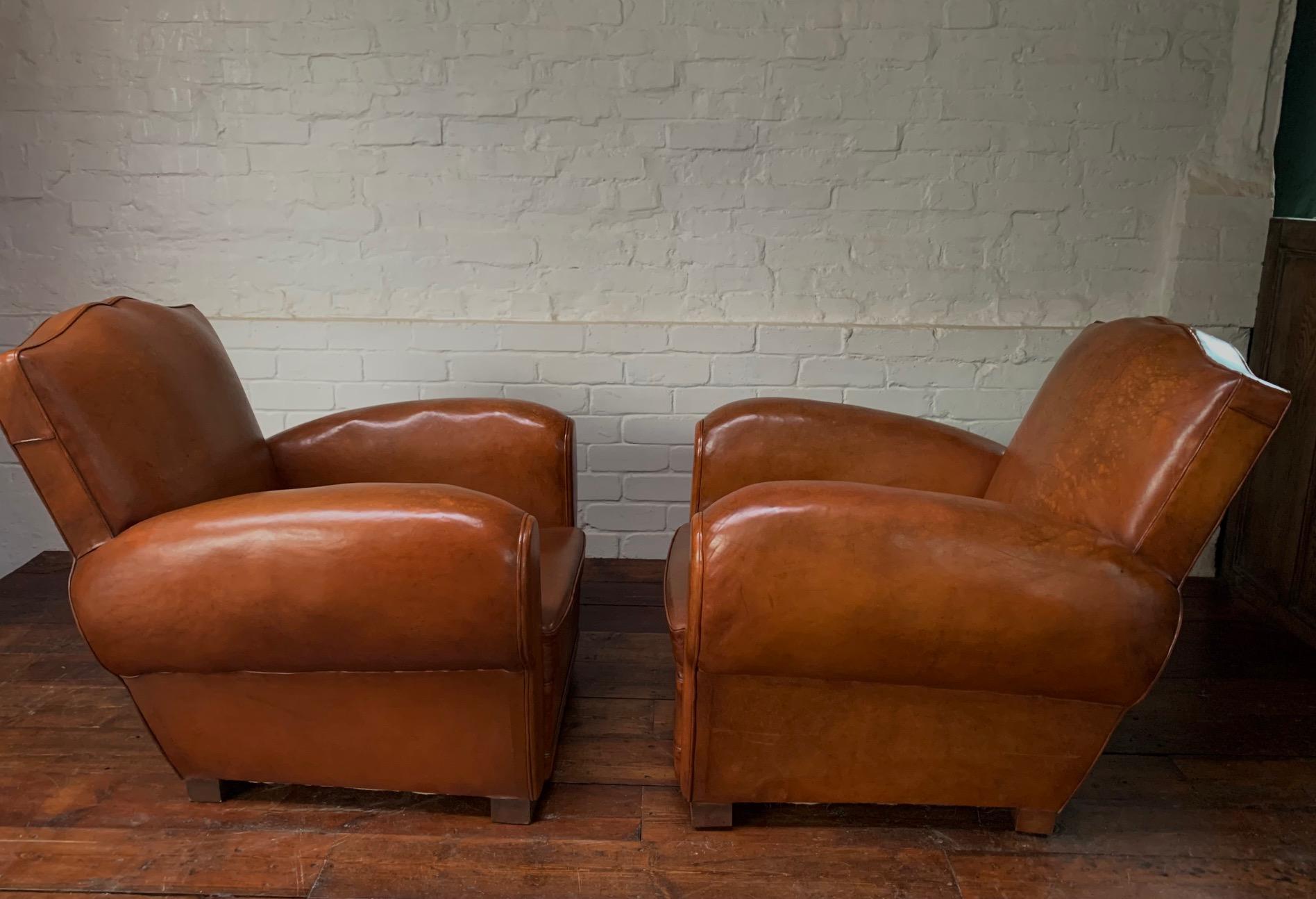 A Stunning Pair of French Leather Club Chairs, Caramel Moustache Models, C1940's 1
