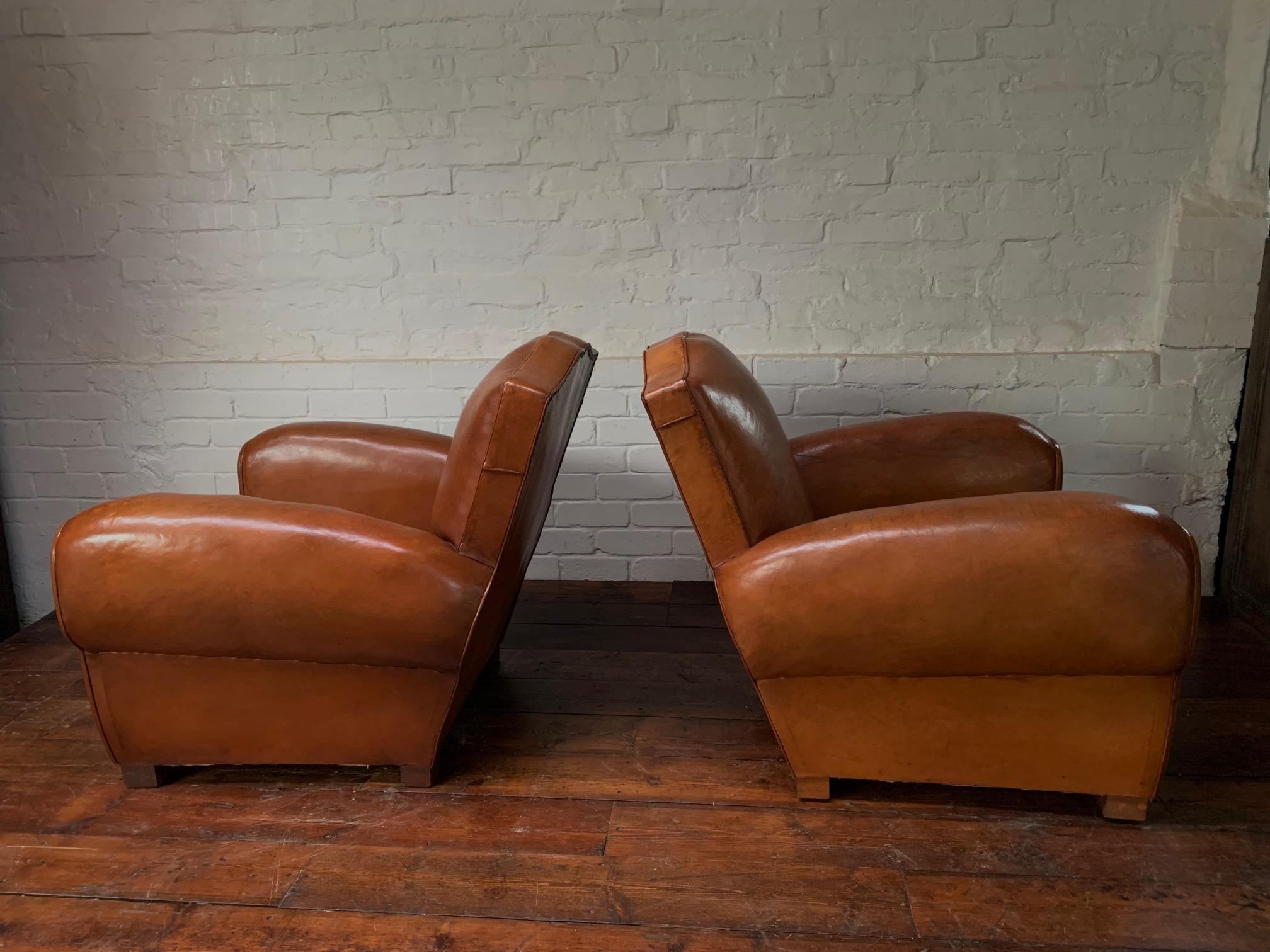 A Stunning Pair of French Leather Club Chairs, Caramel Moustache Models, C1940's 2
