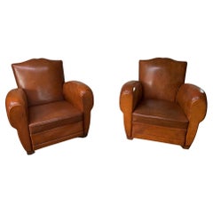 A Stunning Pair of French Leather Club Chairs, Caramel Moustache Models, C1940's