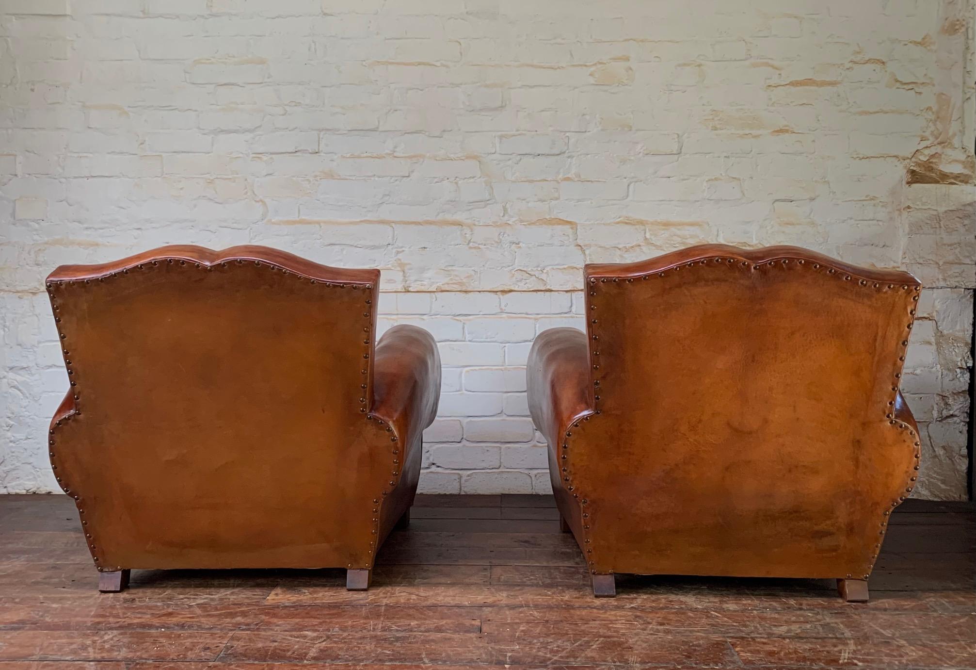 A Stunning Pair of French Leather Club Chairs, Havana Moustache Models, C1930's 1
