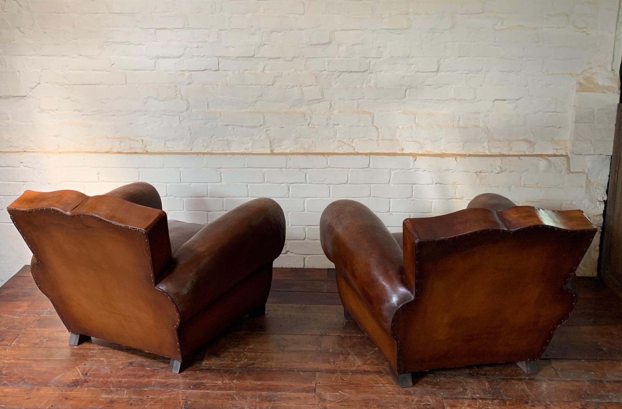 20th Century A Stunning Pair of French Leather Club Chairs, Havana Moustache Models, C1950's