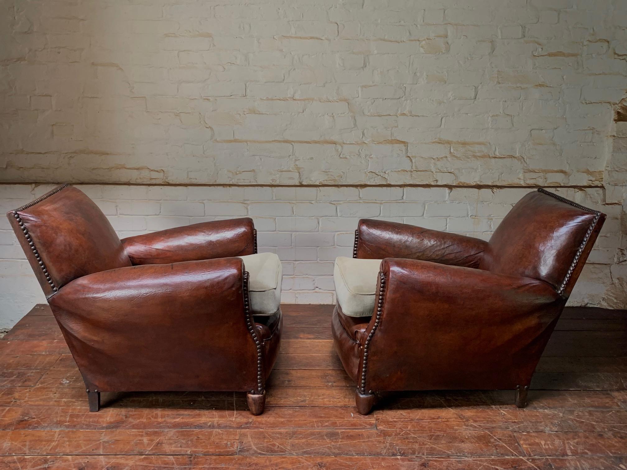 20th Century A Stunning Pair of French Leather club Chairs, Normandy Model Circa 1920’s For Sale