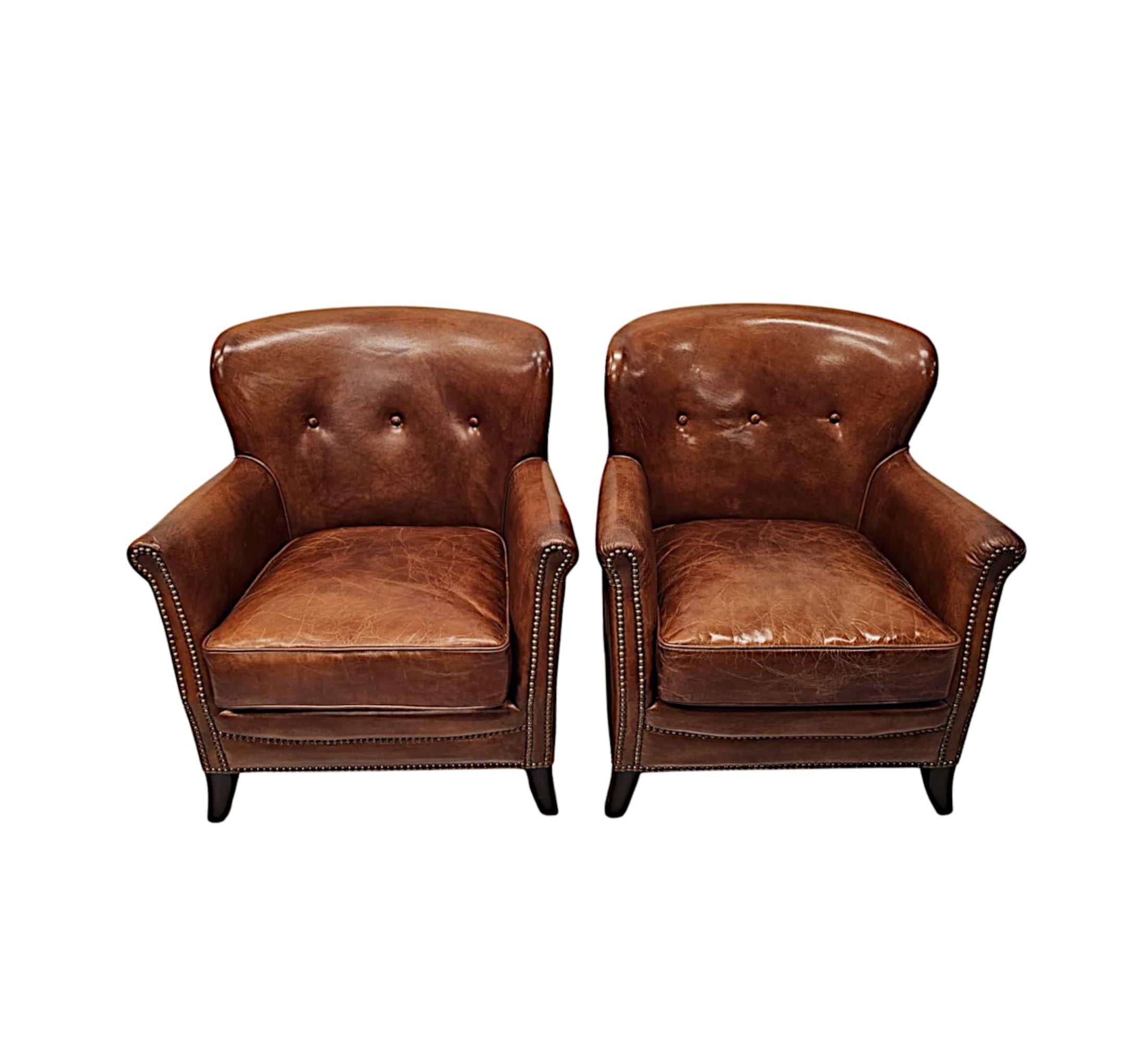 Contemporary A Stunning Pair of Small Leather Club Armchairs in the Art Deco Style