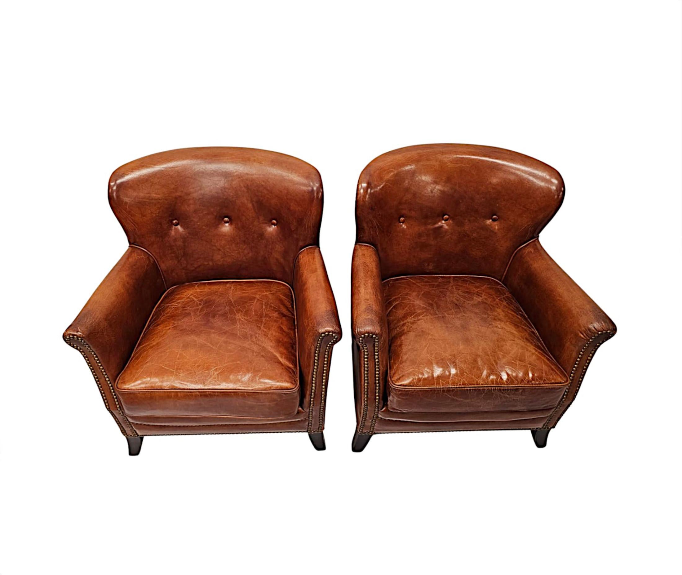 Contemporary A Stunning Pair of Small Leather Club Armchairs in the Art Deco Style 