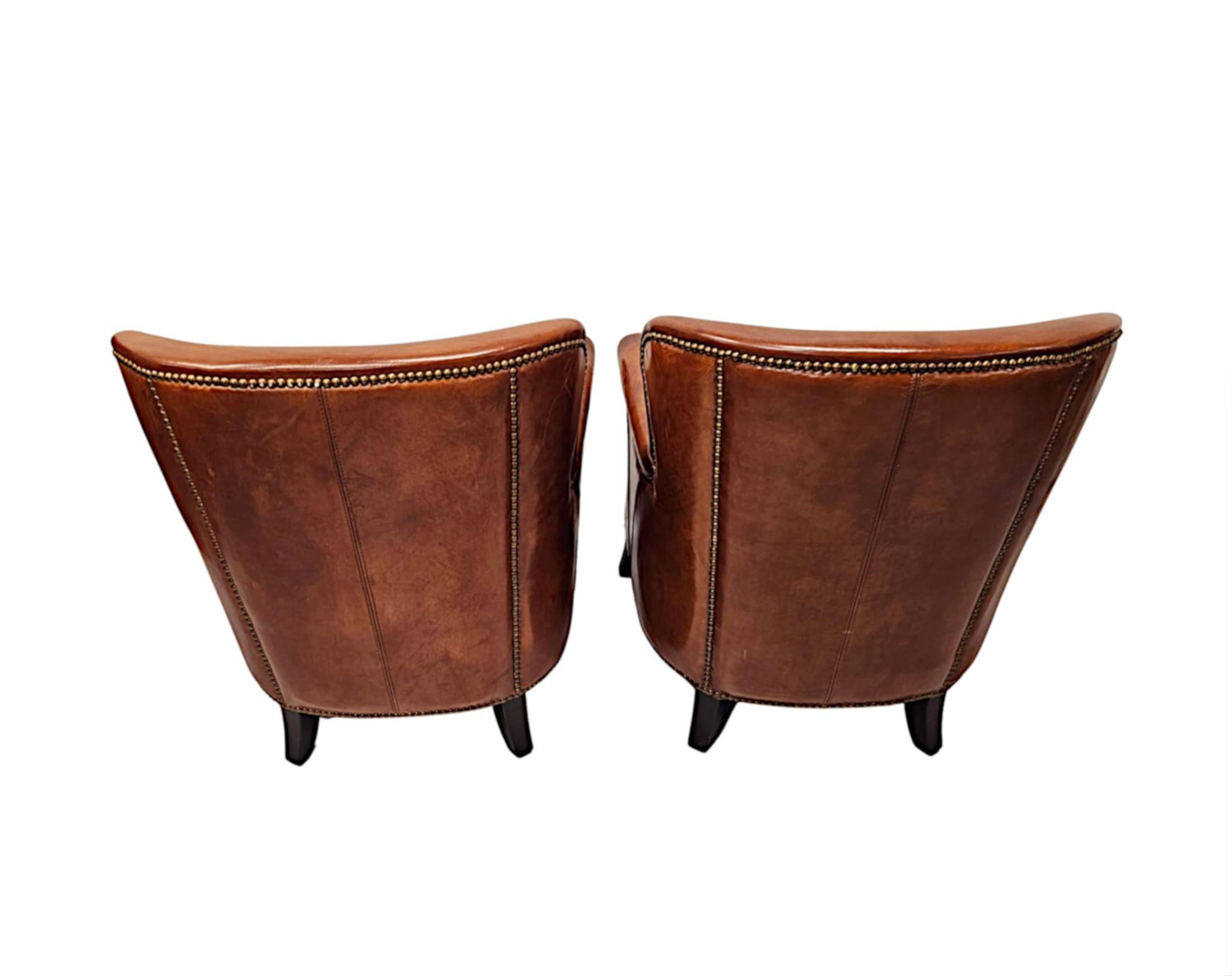 A Stunning Pair of Small Leather Club Armchairs in the Art Deco Style  1