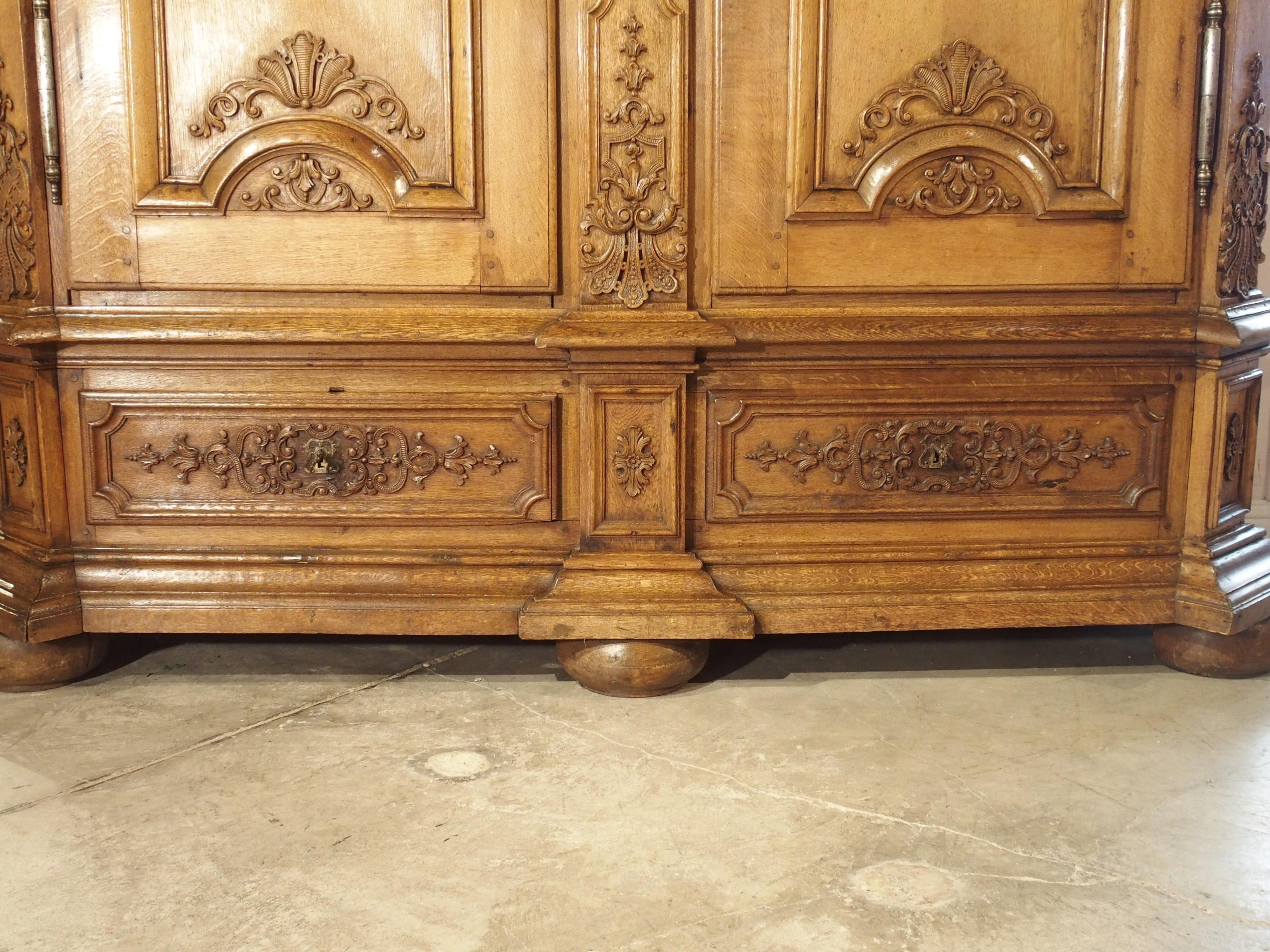 French Stunning Period Regence Armoire in Carved Oak, France, Circa 1720 For Sale