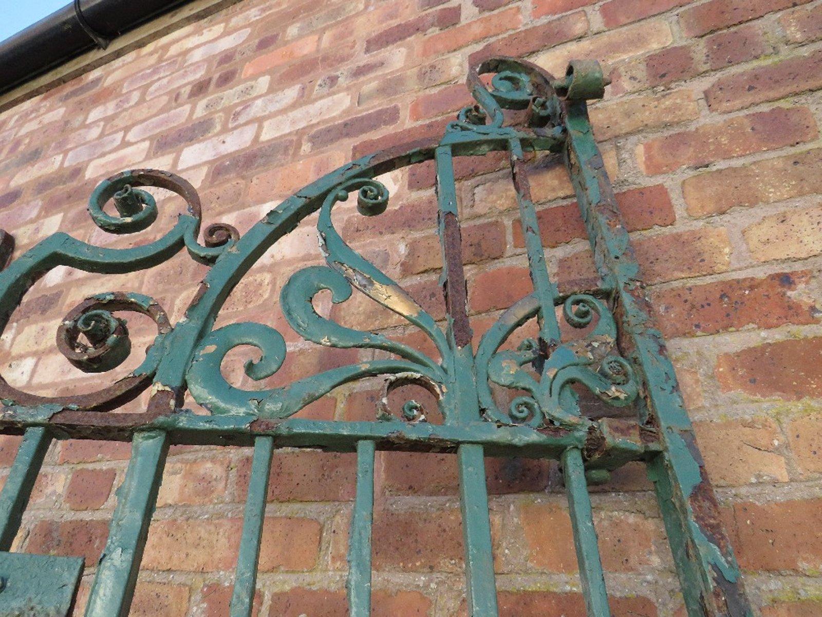 English An exceptional period pair of Arts & Crafts hand hammered & wrought iron gates For Sale