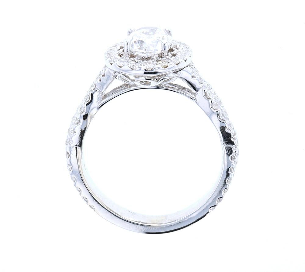 Modern Stunning Twisted Shank Oval Diamond Engagement Ring with Diamond Pave For Sale