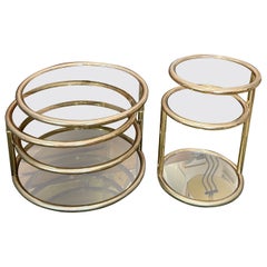 A stunning vintage 3 tiered brass and smoked glass swivel table, side table sold