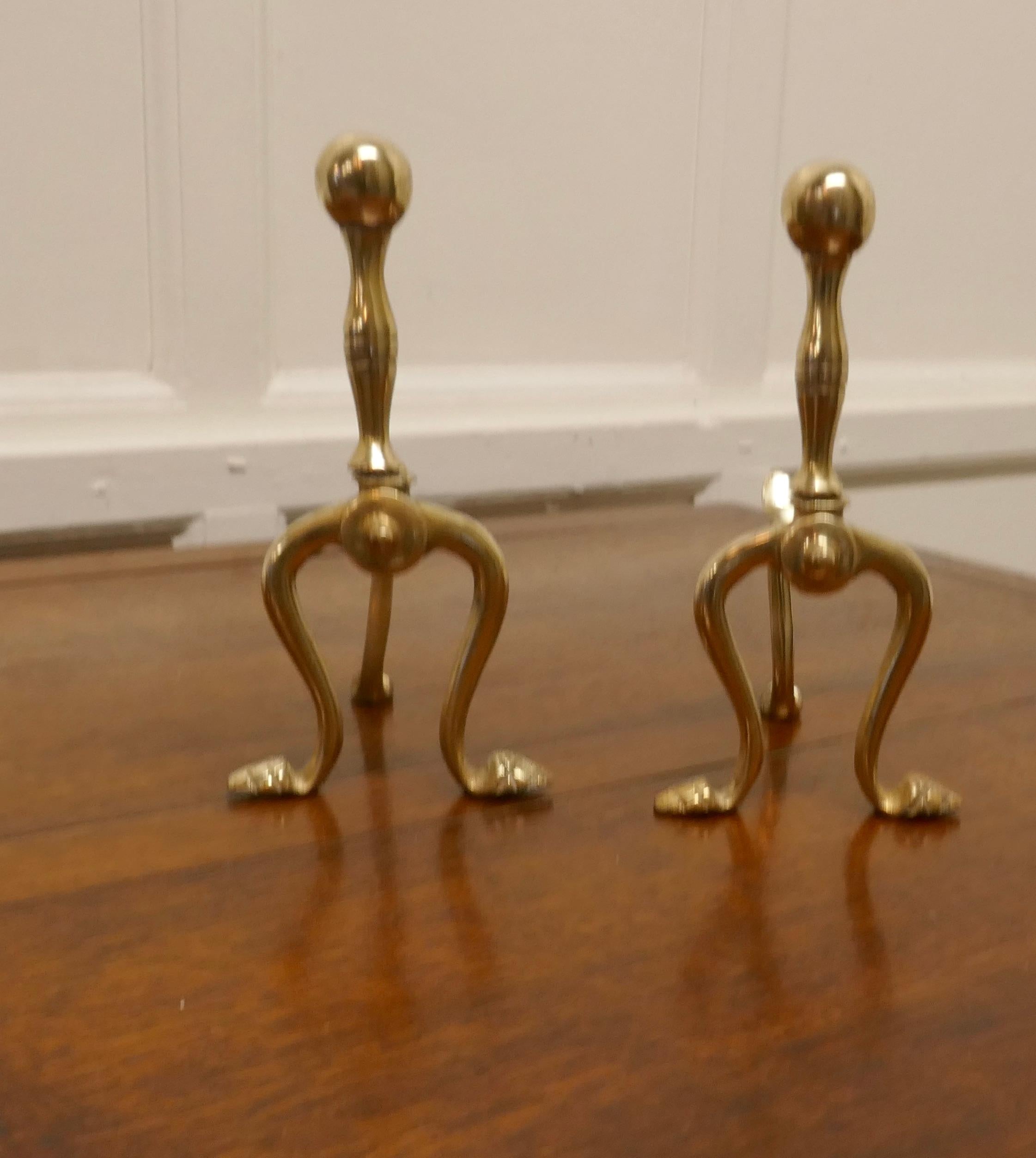 A sturdy pair of Victorian brass andirons or fire dogs


This very attractive pair of brass Andirons is 10” high, 8” long and 5” wide across the front, they are in excellent but obviously used condition, just what you fire tools need to keep them