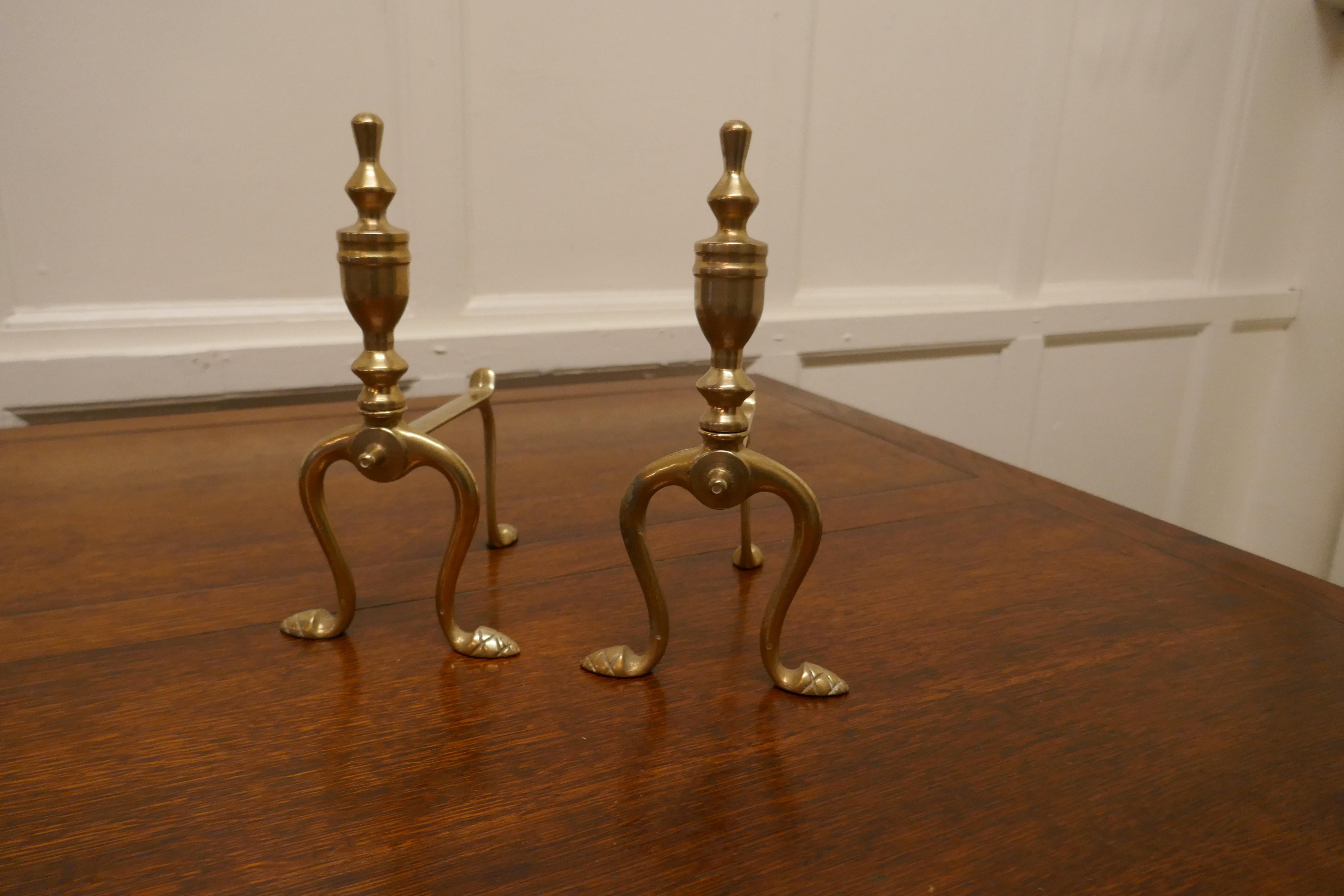 A sturdy pair of Victorian brass andirons or fire dogs


This very attractive pair of brass Andirons is 10” high, 8” long and 6” wide across the front, they are in excellent but obviously used condition, just what you fire tools need to keep them