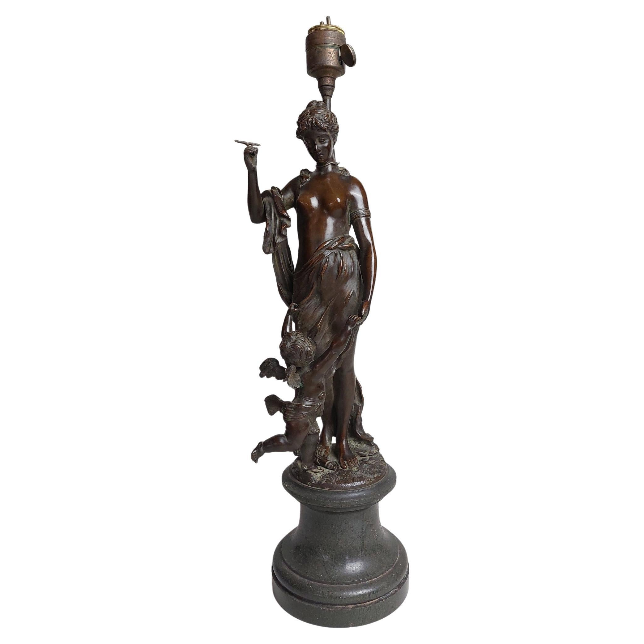 Stylish 19th Century Bronze Lamp Base of a Half Nude Lady with Cherub For Sale