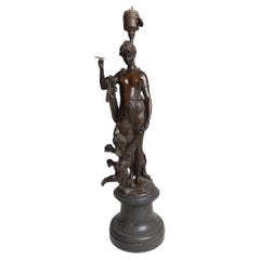 Ein stilvoller Bronze-Lampensockel aus dem 19. Jahrhundert mit einer halben nackten Dame mit Cherub