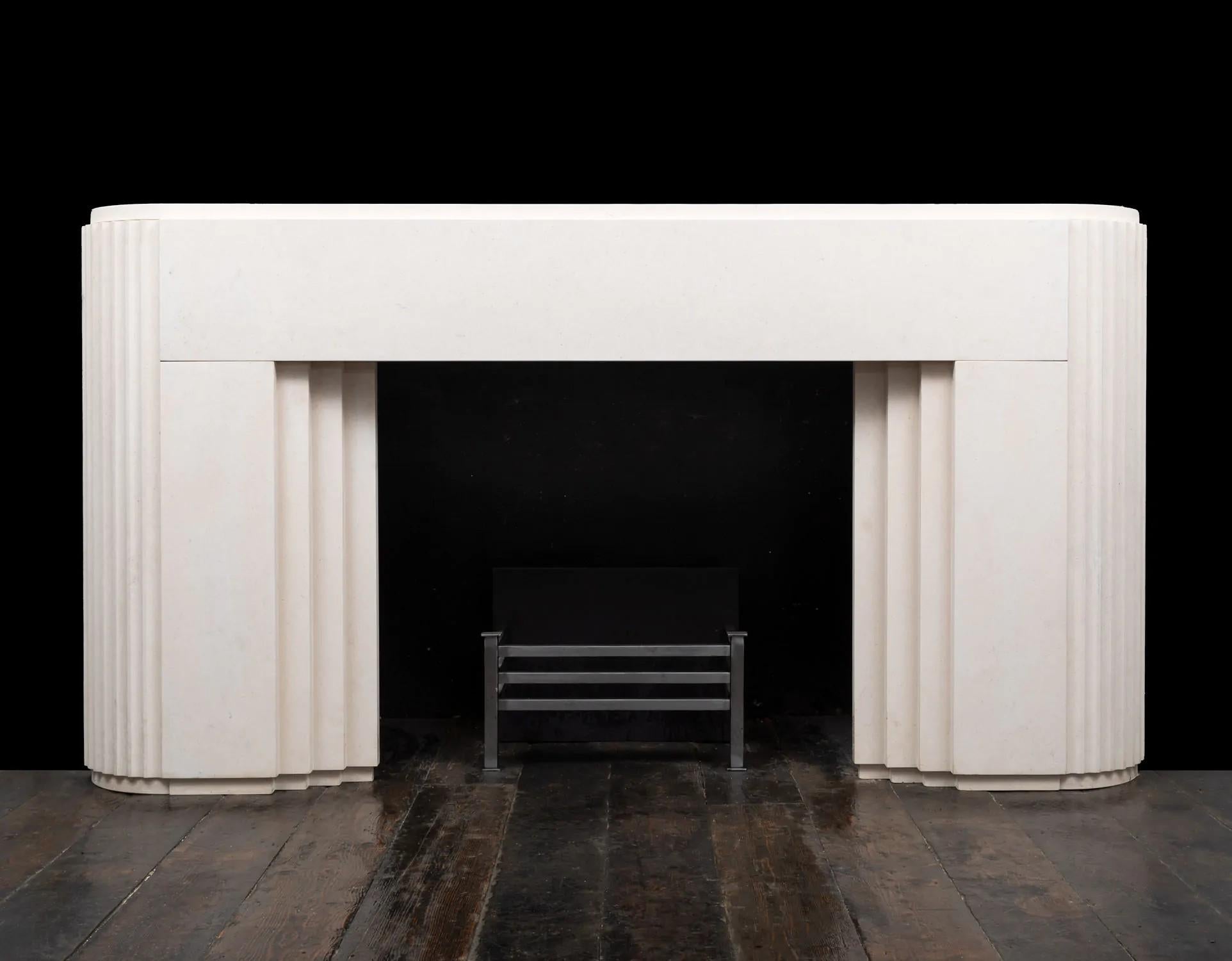 A stylish 'Art Deco' inspired limestone fireplace surround 

With curved and fluted outside returns, plain front panels, triple stepped interior and raised mantel. 

Can be made to size in our Irish workshop from a choice of materials. Can also be