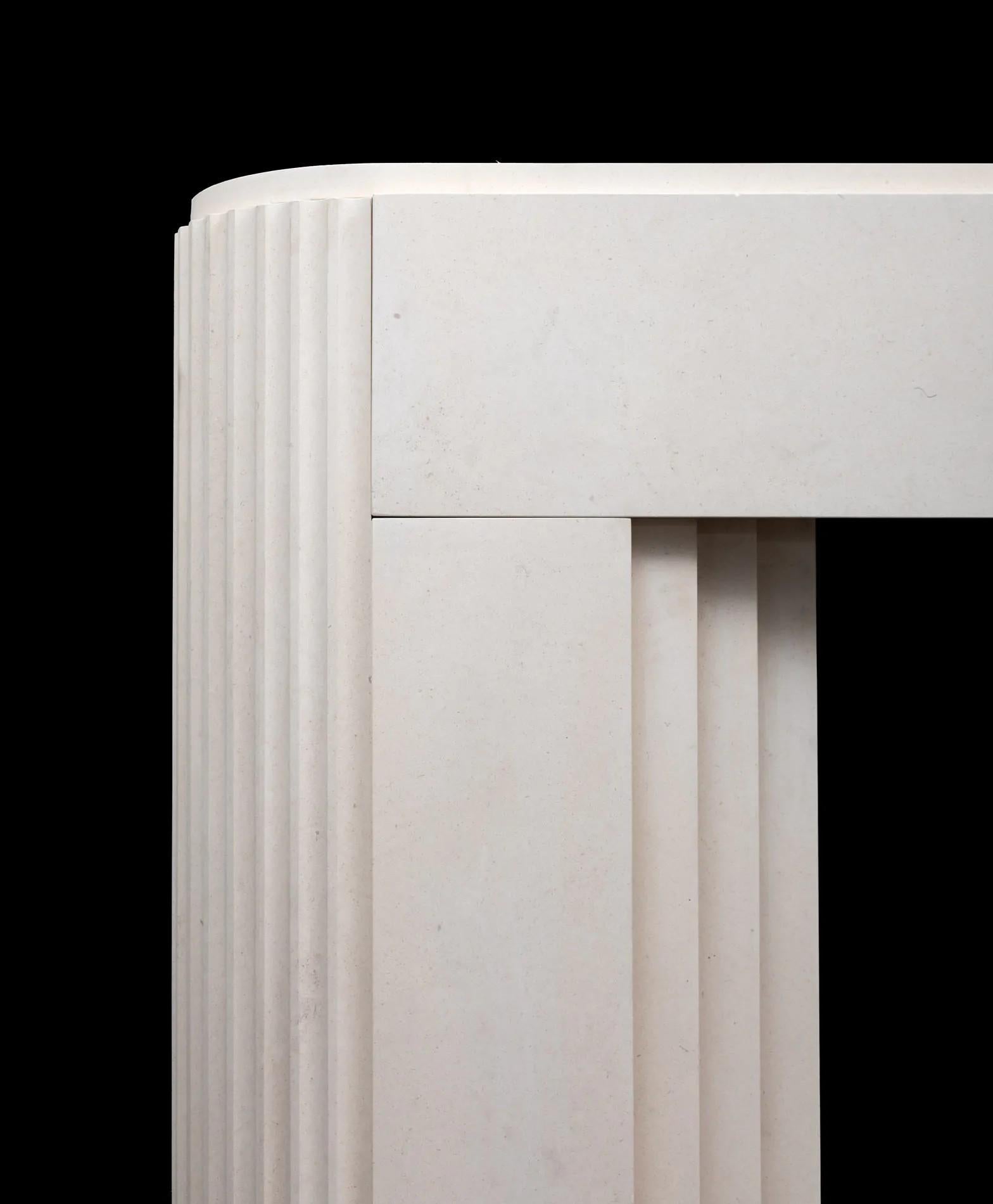 Northern Irish A stylish ‘Art Deco’ inspired limestone fireplace mantel by 'Ryan and Smith' For Sale