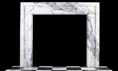A Stylish & Elegant Bolection Fireplace Surround in Italian Arabescato Marble
