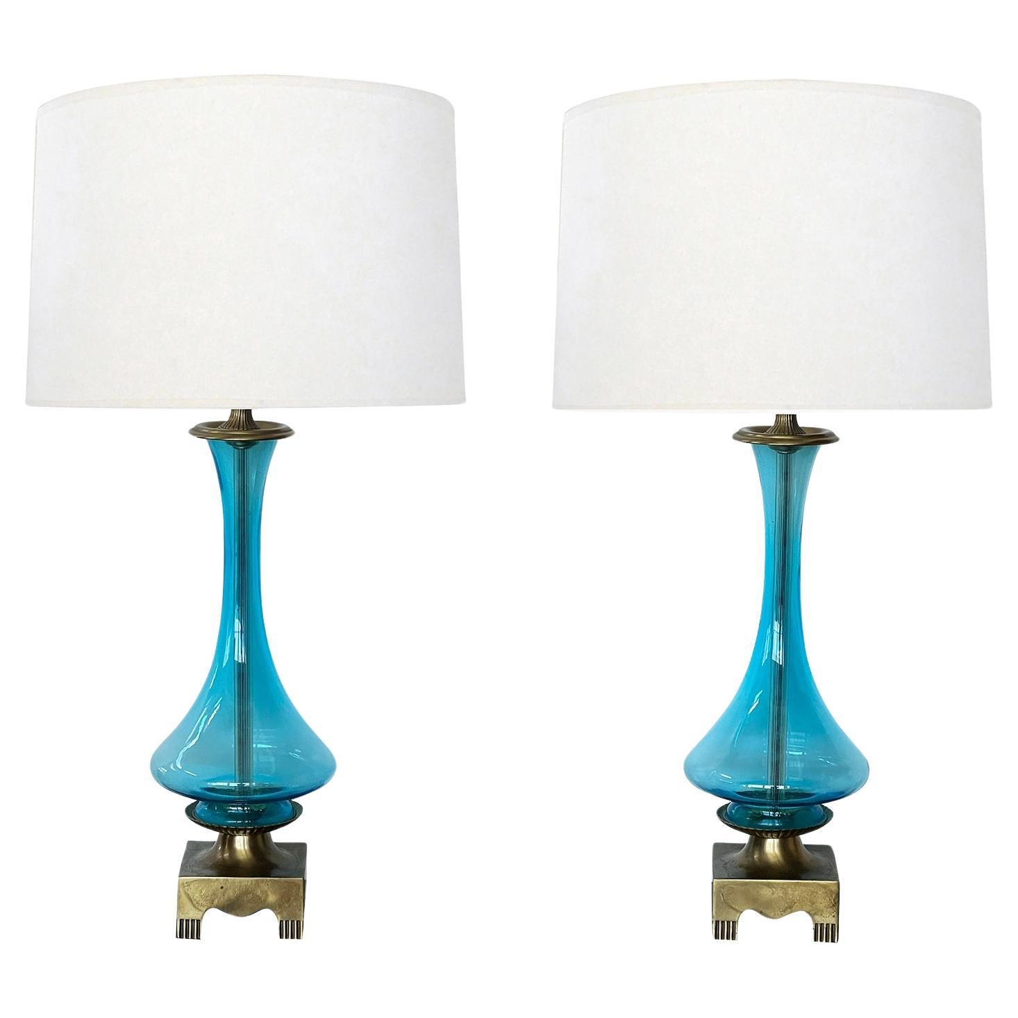 A Stylish Pair of Cerulean Blue Clear Glass Bottle-form Lamps For Sale