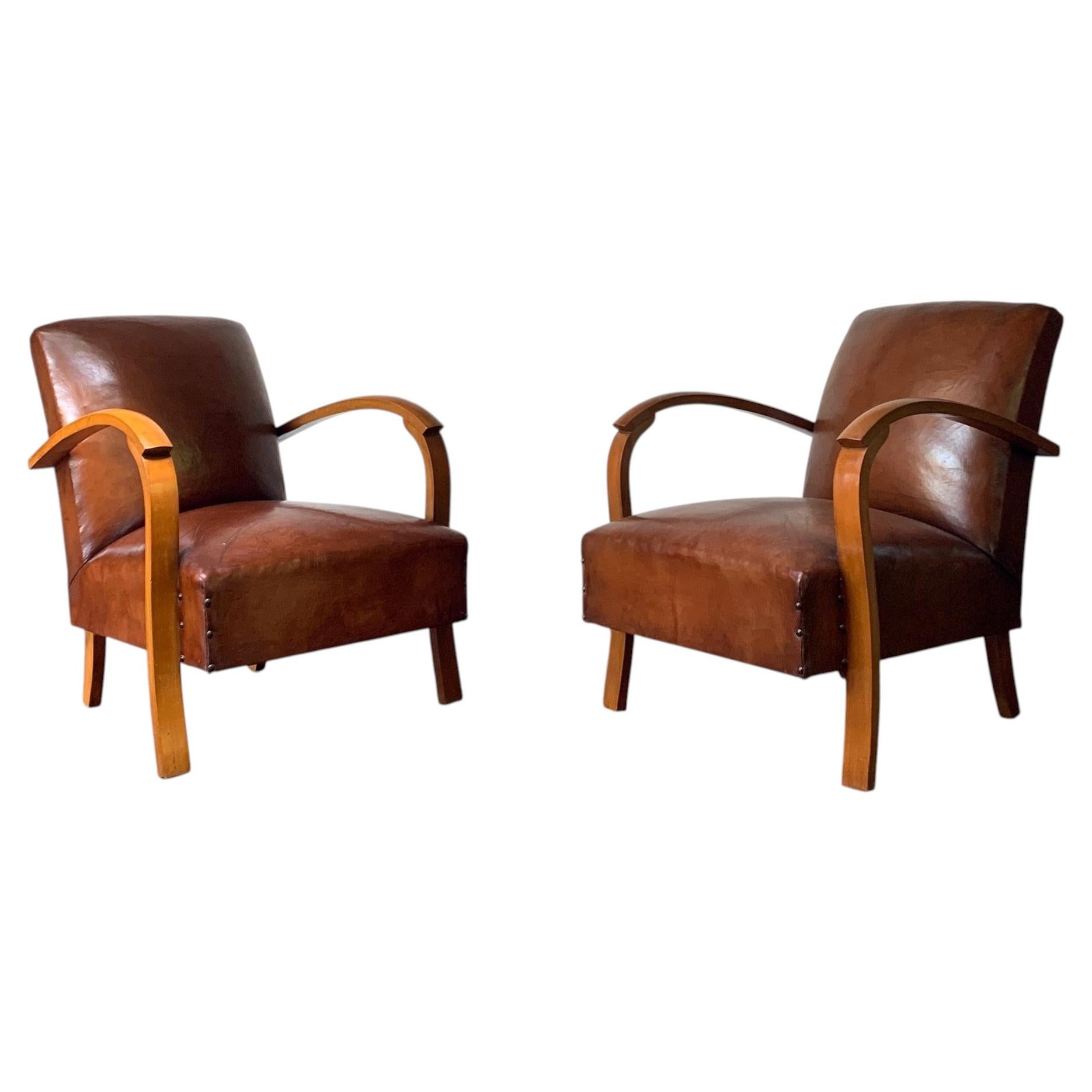 A Stylish & Rare Pair of Mid-Century Leather Lounge Chairs, France Circa 1950’s