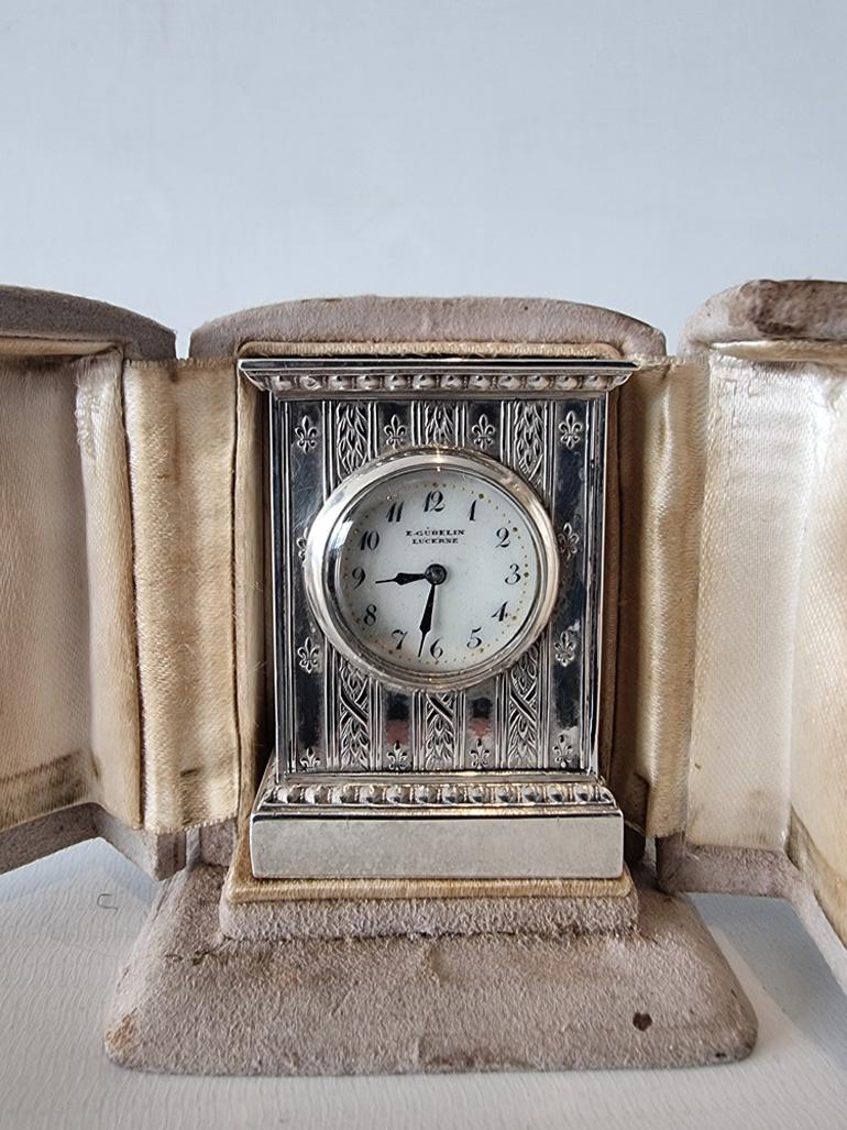 Engraved A sub miniature  engraved Silver Carriage or Boudoir Clock by Gubelin in case