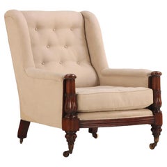 A substantial English Regency carved mahogany library chair, C 1830.
