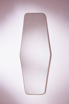 A substantial midcentury modernist wall mirror with brass frame, Italy, 1950s