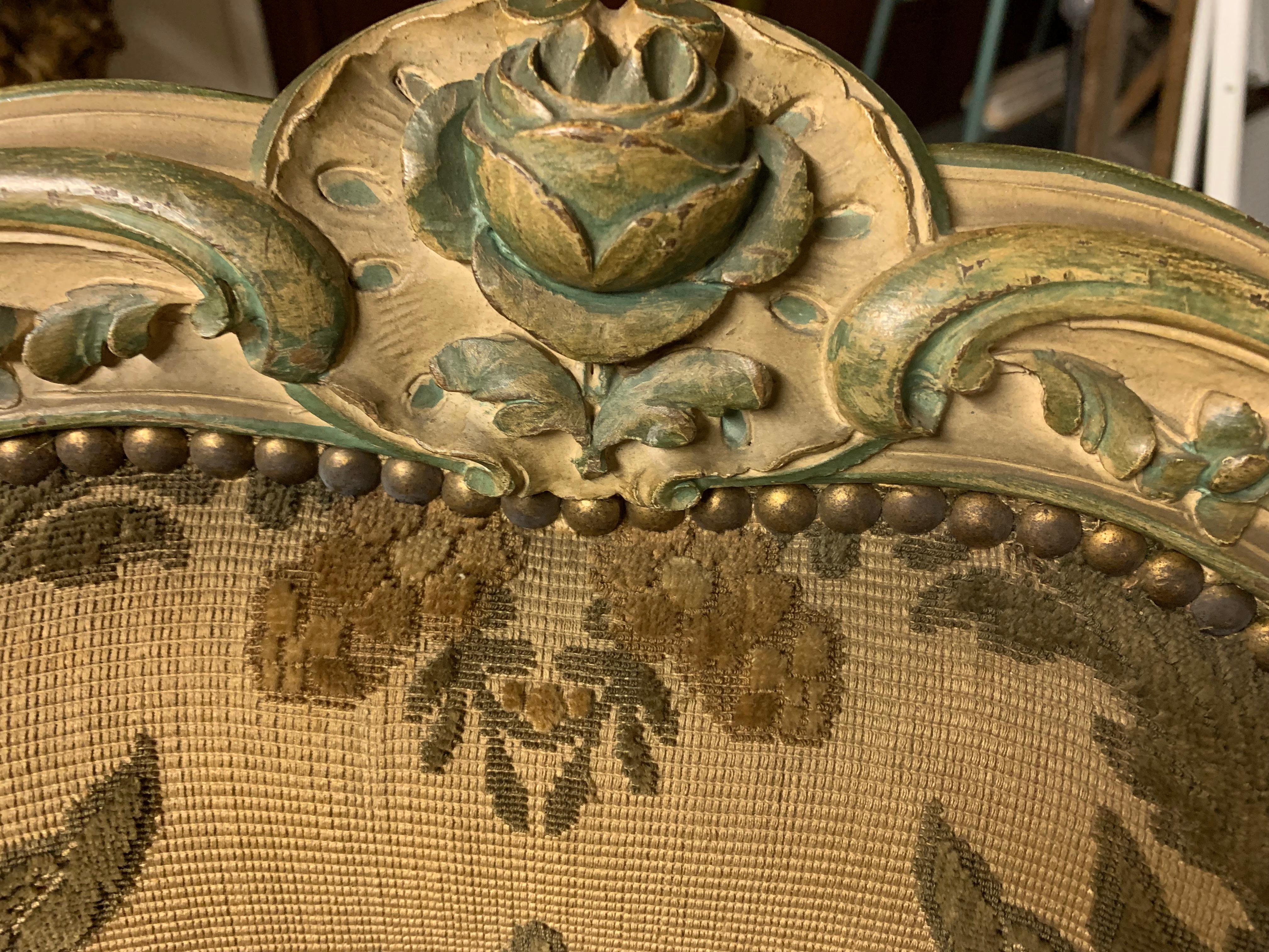 A very rare suite of 4 armchairs Louis XV style, the carving, the hand painting of this 4 armchairs are stunning sold as is.