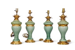 Una suite di quattro lampade in porcellana verde celeste con montatura in ormù di Theodore Deck