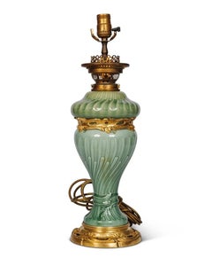 A Suite of Four Theodore Deck Ormolu-Mounted Celadon Green Porcelain Lamps