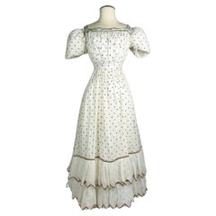 Antique A Summer day dress in cotton muslin embroidered with wool Circa 1820-1825