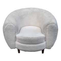 A SUMPTUOUS BOUCLE ARMCHAIR BY GUGLIELMO ULRICH - ATTRIBUTED c1950