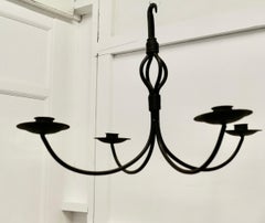 A Superb Aesthetic Iron Hanging Candelier  A very handsome piece.