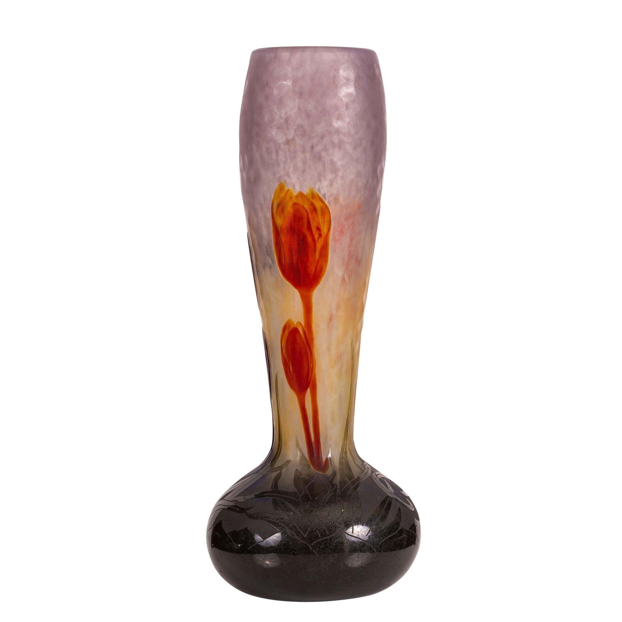 A superb and very fine Daum Nancy wheel-carved cameo and martele glass vase, with low relief applied decoration
France, circa 1910
Signed in intaglio Daum Nancy with lorraine cross 
Height 12 in. (304.8 mm.)
Width 4 1/2 in. (114.3